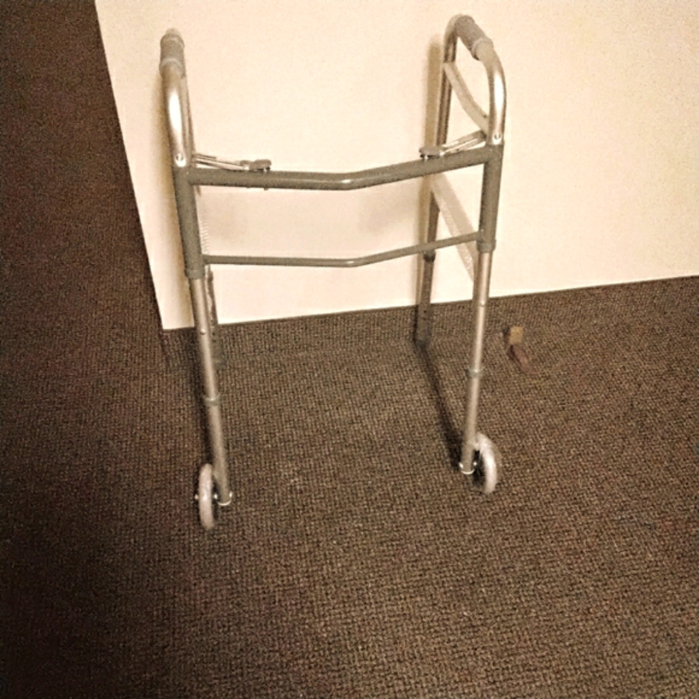 2 BUTTON ADJUSTABLE WALKER WITH 5" WHEELS BRAND NEW
